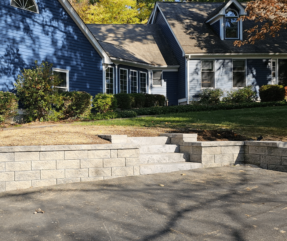 Custom retaining wall for Hampden, Ma, demonstrating Keith Isham's professional hardscaping solutions